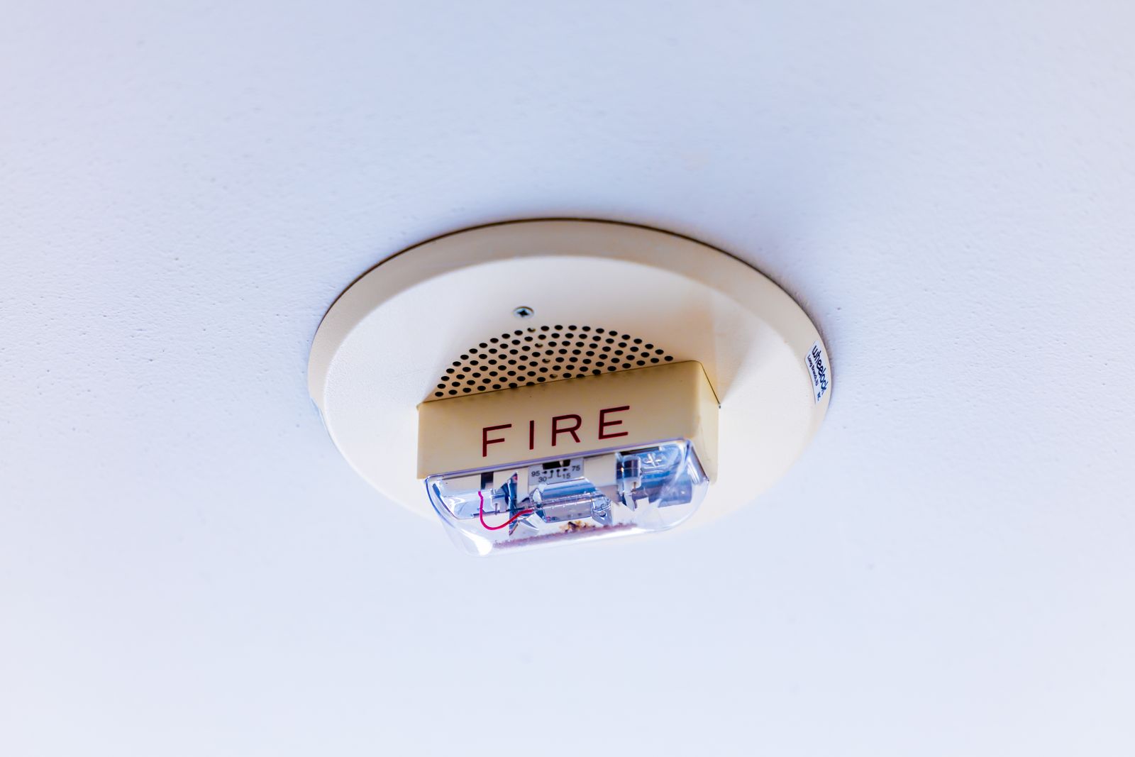 A ceiling-mounted fire alarm